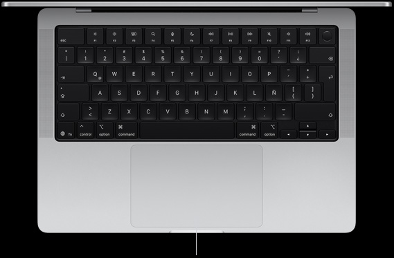 Vista desde arriba de un MacBook Pro de 14 pulgadas que muestra el trackpad Force Touch debajo del teclado
