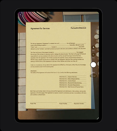 iPad Pro, front exterior, portrait orientation, space black colour, display showing a scanned document titled 'Agreement for Services' with text and signature lines clearly visible