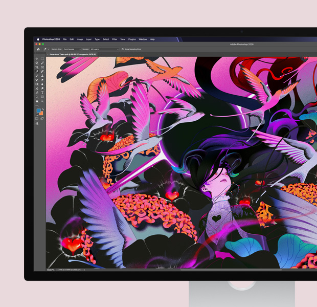 Studio Display。画面にAdobe Photoshopの編集ソフトウェアと抽象的なアートワークが表示されている