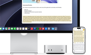 Mac mini front, tucked under Studio Display, an iPhone sits to the right of the device and the display, text selected with cut, copy, paste, and AutoFill commands above on iPhone matches highlighted text on display, showcasing Universal Clipboard
