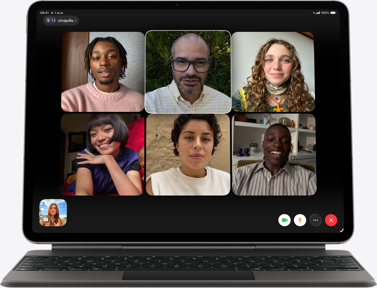 iPad Air, front exterior, Magic Keyboard, black color, FaceTime call on the screen, multiple participants visible
