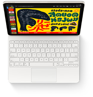 มุมมองจากบนลงล่างของ iPad Air ที่ติดเข้ากับ Magic Keyboard สำหรับ iPad Air สีขาว