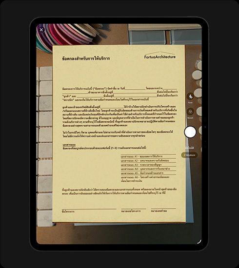 iPad Pro, front exterior, portrait orientation, space black color, display showing a scanned document titled 