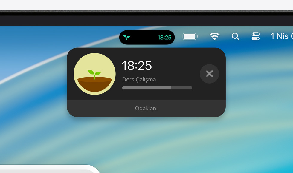 Mac aygıtı ekranının tepeden görünümünde Forest uygulaması için genişletilmiş Canlı Etkinlik ile menü çubuğu gösteriliyor