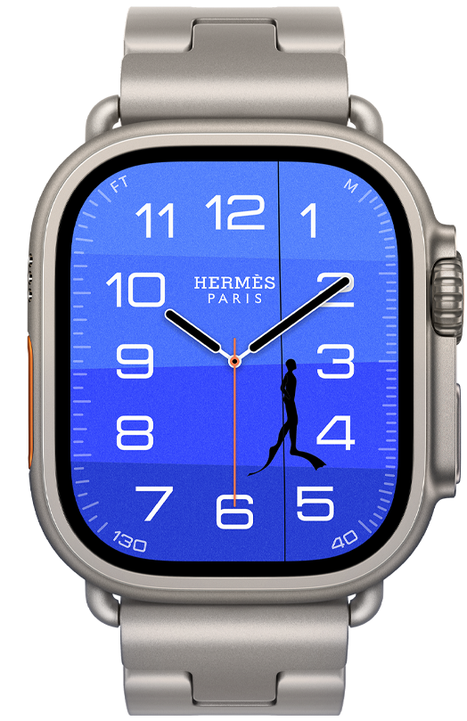 Apple Watch Hermès Ultra 4, quadrante analogico Fathom and Wonder (lancette dell’ora, dei minuti e dei secondi, complicazione Profondità, immagine di una boa arancione che fluttua su un oceano turchese con sfumature da blu chiaro a blu scuro), cassa in titanio naturale, lato destro, Digital Crown, tasto laterale in rilievo, cinturino Grand H Titane color Gris Titane