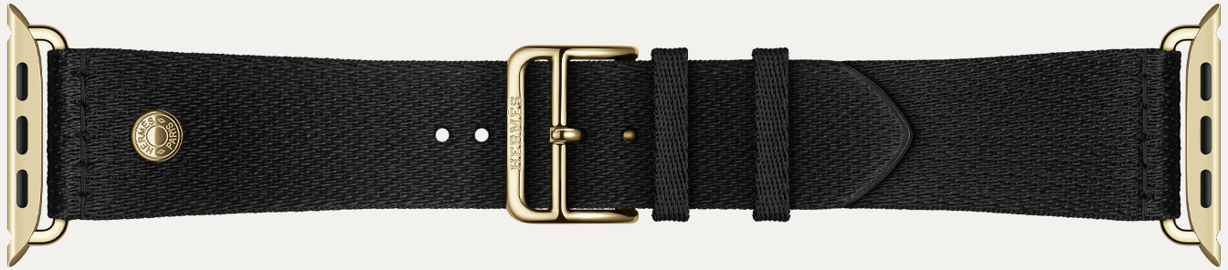 Dettaglio del cinturino Satin Clou de Selle color Noir per Apple Watch Hermès Series 12, tessuto satinato nero liscio con chiusura e anse color oro brillante