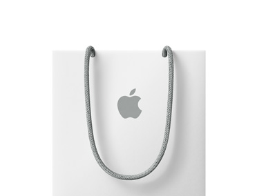 Bílá nákupní taška s logem Apple v horní části