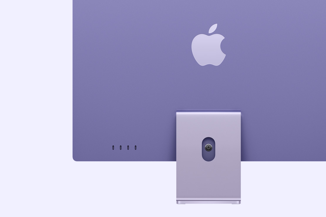 Violetinės spalvos „iMac“ vaizdas iš galo, išryškinant 4 USB‑C prievadus