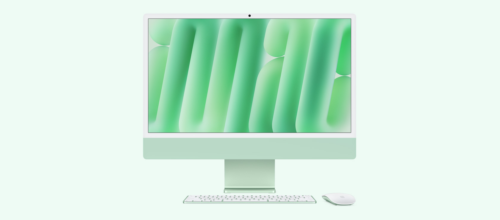Žalios spalvos „iMac“ su spalvą atitinkančia pele ir klaviatūra vaizdas iš priekio