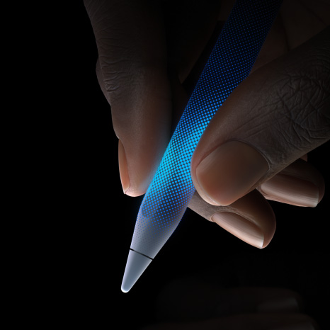 User holds Apple Pencil Pro. Area before tip of Apple Pencil is touch sensitive, showcasing the haptic feedback