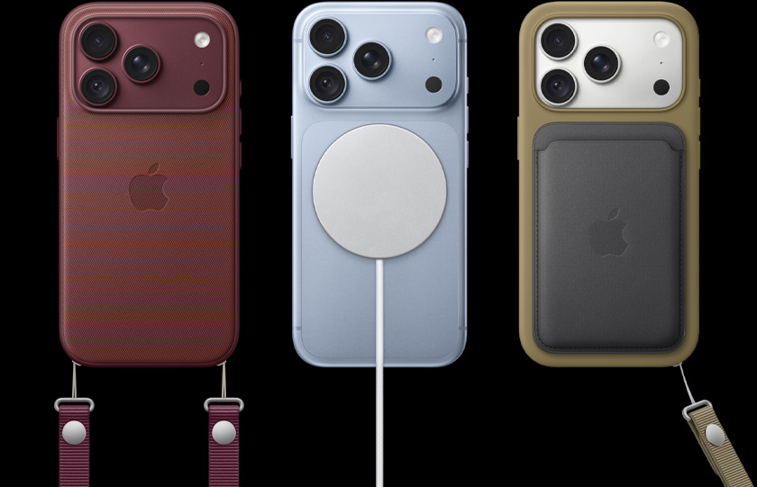 From left to right, iPhone 18 Pro in Burgundy leather case with Burgundy Crossbody strap, middle iPhone 18 Pro in Glacier with White MagSafe charger attached, right iPhone 18 Pro in Silver in green phone case, black leather wallet case with wrist strap.