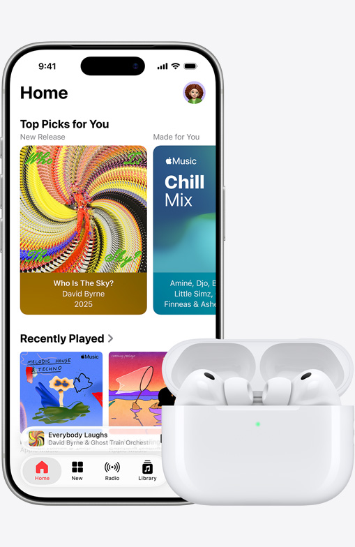 iPhone 17 Pro, front exterior, Apple Music app with Home Screen open, next to AirPods Pro 3 in open MagSafe Charging case