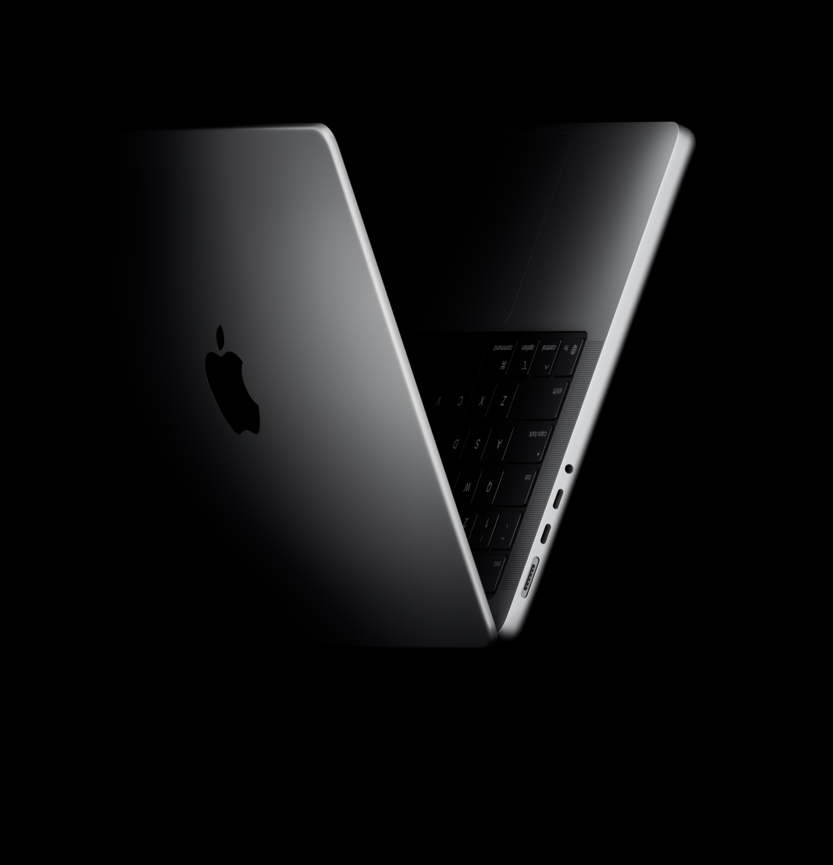 MacBook Pro positioned into the shape of a V, referencing the M5 chip
