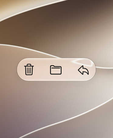 Les boutons de fonction de l’app Mail, Supprimer, Déplacer et Répondre, sur un fond or tourbillonnant, avec un contraste élevé qui les rend très lisibles